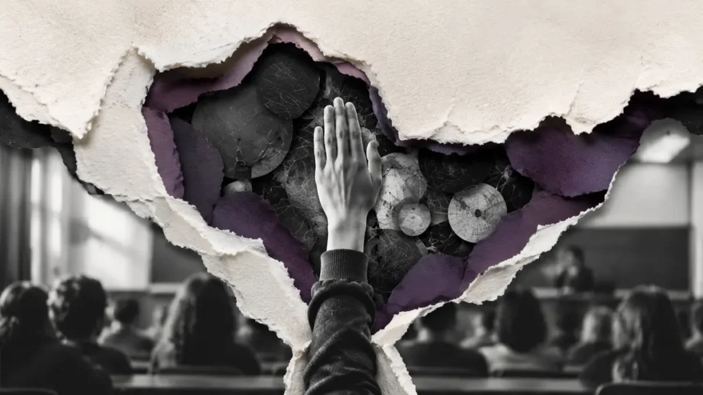 A raised hand breaks through torn classroom paper, revealing deeper technical layers beneath.
